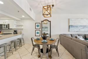 a living room with a couch and a table at HP 23W Calypso Crossing by 30A Escapes in Rosemary Beach +19 photos