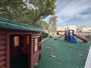 a playground with a slide and a slideintend at Residencial Ilha do Governador in Rio de Janeiro