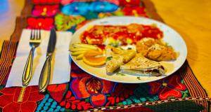 a plate of food on top of a table at Hospedaje Mulege in Puerto Peñasco