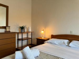 Postel nebo postele na pokoji v ubytování Konstantinos Junior Apartment II
