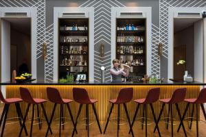 
The lounge or bar area at art'otel berlin mitte, part of Radisson Hotel Group
