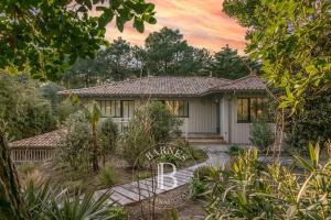 Κήπος έξω από το La Cabane du Cap Ferret