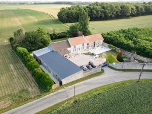 an aerial view of a large house with a driveway at La Parenthèse d'Amour - La Ferme du Bois aux Dames in Soisy-Bouy
