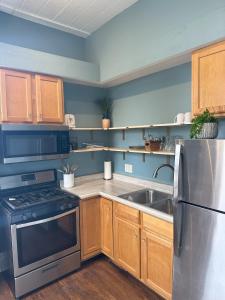 Køkken eller tekøkken på Boutique Studio Apartment