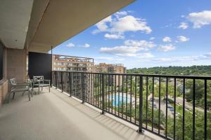 a balcony with a view of a building at Boutique Suite-Sleeps 7-Free Parking-Balcony Views in Arlington