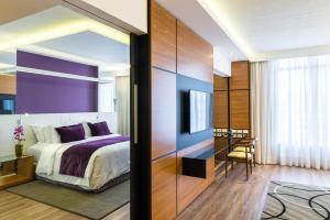 Postel nebo postele na pokoji v ubytování Radisson Hotel Curitiba