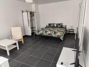 Ένα ή περισσότερα κρεβάτια σε δωμάτιο στο O'Couvent - Appartement 212 - 1 chambre - 63 m2 - Premier étage