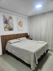 Postel nebo postele na pokoji v ubytování West Fit Padrão 04