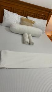 En eller flere senge i et værelse på African Angel House B&B