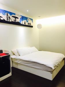 Letto o letti in una camera di Kenting A&S