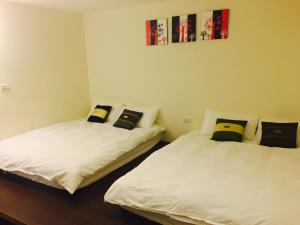 Letto o letti in una camera di Kenting A&S