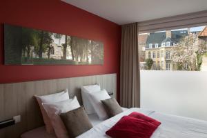 Postelja oz. postelje v sobi nastanitve B&B 't Withuis