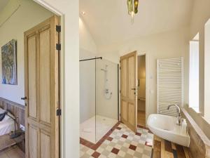 a bathroom with a tub and a sink and a shower at Villa Lactea in Schilde +87 photos