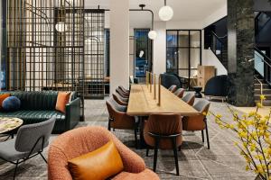 a conference room with a table and chairs at Sheraton Minneapolis Downtown Convention Center in Minneapolis