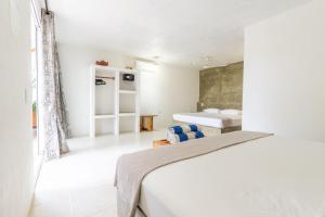 Postel nebo postele na pokoji v ubytování CasaPiedra