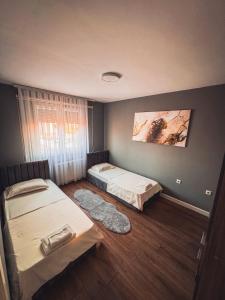 Ένα ή περισσότερα κρεβάτια σε δωμάτιο στο Don_house +10 φωτογραφίες