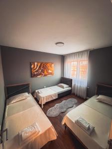 Ένα ή περισσότερα κρεβάτια σε δωμάτιο στο Don_house