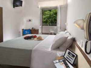 Televisyen dan/atau pusat hiburan di Mon Hotel