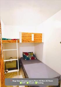 Ένα ή περισσότερα κρεβάτια σε δωμάτιο στο Budget Non-Aircon Room Cabuyao