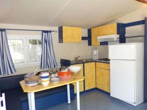 Fotografie z fotogalerie ubytování Mobil Home avec Terrasse, 3 Chambres, 6 Pers. - API-1-52-247 v destinaci La Cassagne