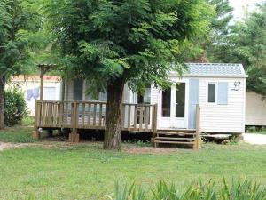 Photo de la galerie de l'établissement Mobil home 26m² avec Terrasse - 4 personnes - API-1-52-339, à La Cassagne