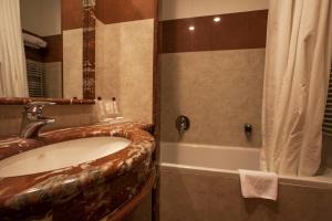 Koupelna v ubytování Grand Hotel la Chiusa di Chietri