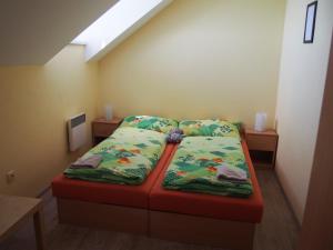 Postel nebo postele na pokoji v ubytování Penzion u Ivana