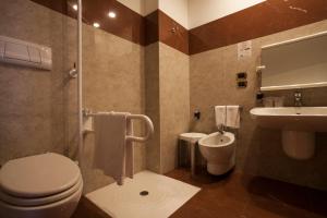 Koupelna v ubytování Grand Hotel la Chiusa di Chietri
