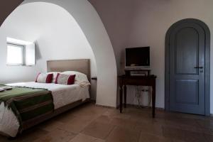 Postel nebo postele na pokoji v ubytování Grand Hotel la Chiusa di Chietri