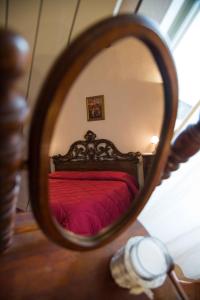 Posteľ alebo postele v izbe v ubytovaní Domus Ghibellinae- Fonte di San Benedetto