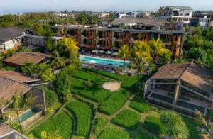 an aerial view of a resort with a pool at Shore Amora Canggu in Canggu