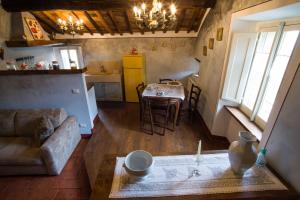 Kuchyňa alebo kuchynka v ubytovaní Domus Ghibellinae- Fonte di San Benedetto