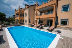 an image of a villa with a swimming pool at Villa Ljubica in Vodice
