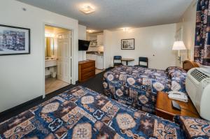 Krevet ili kreveti u jedinici u objektu Tampa Bay Extended Stay Hotel