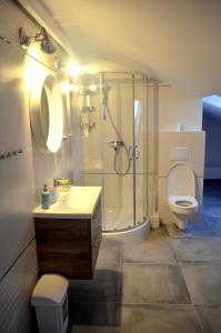 Kúpeľňa v ubytovaní Apartamenty Sailor i Comfort House Giżycko