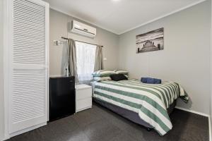 Ένα ή περισσότερα κρεβάτια σε δωμάτιο στο The Barracks Wagin