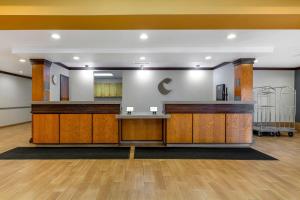 a lobby of a hospital with a reception desk at Comfort Inn & Suites Akron South in Akron