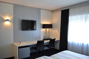 TV a/nebo společenská místnost v ubytování B&B Pommerloch