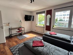 TV a/nebo společenská místnost v ubytování Am Park