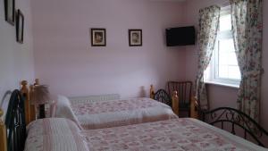 Postel nebo postele na pokoji v ubytování Villa Pio Accommodation Cong