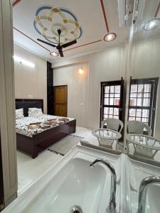 Ένα ή περισσότερα κρεβάτια σε δωμάτιο στο Private room -Tulsi Homestay