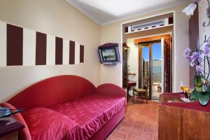 TV a/nebo společenská místnost v ubytování Hotel Prestige