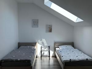 Postel nebo postele na pokoji v ubytování AP Apartament