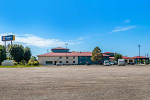 a large parking lot in front of a gas station at Comfort Inn Las Vegas New Mexico in Las Vegas