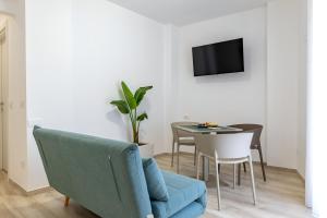 Una televisión o centro de entretenimiento en Le camere Delù