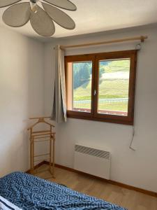 Postel nebo postele na pokoji v ubytování Appartement 2 pièces 6 personnes Col du Corbier