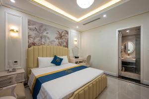 Ένα ή περισσότερα κρεβάτια σε δωμάτιο στο Riverside Hotel +24 φωτογραφίες