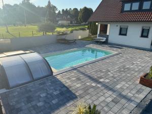 Πισίνα στο ή κοντά στο Ferienhaus in Seenähe