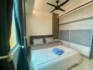 En eller flere senge i et værelse på Airra Minimalist Suite-Ipoh Town