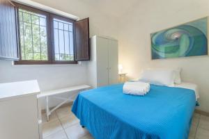 Postel nebo postele na pokoji v ubytování Villa Verdena - Carovigno